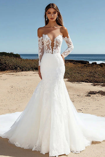 Robe de mariée sirène en tulle ivoire à épaules dénudées